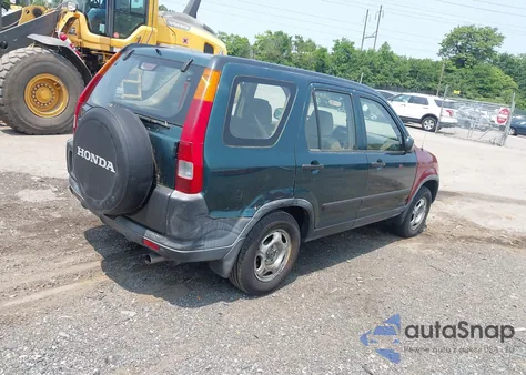 2004 Honda Cr-V Lx z USA, uszkodzony, nr VIN JHLRD68584C013570